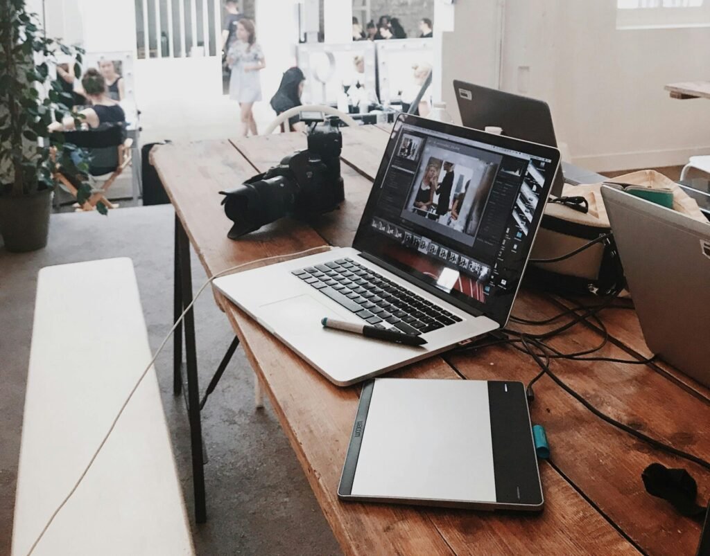 Turned-on Gray Laptop Computer on Table